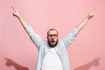 Man looking excited about writing business blogs